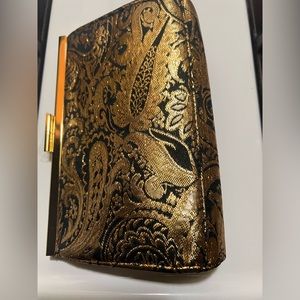 Gold and black clutch small hand held
